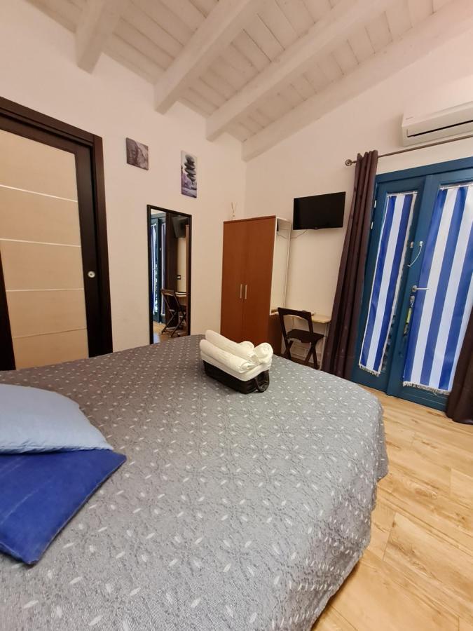 Portopollo Surfhouse Barrabisa Dış mekan fotoğraf