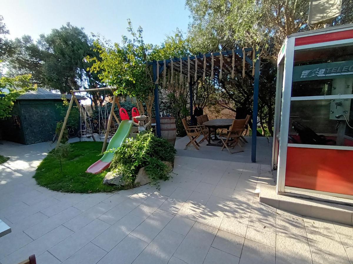 Portopollo Surfhouse Barrabisa Dış mekan fotoğraf