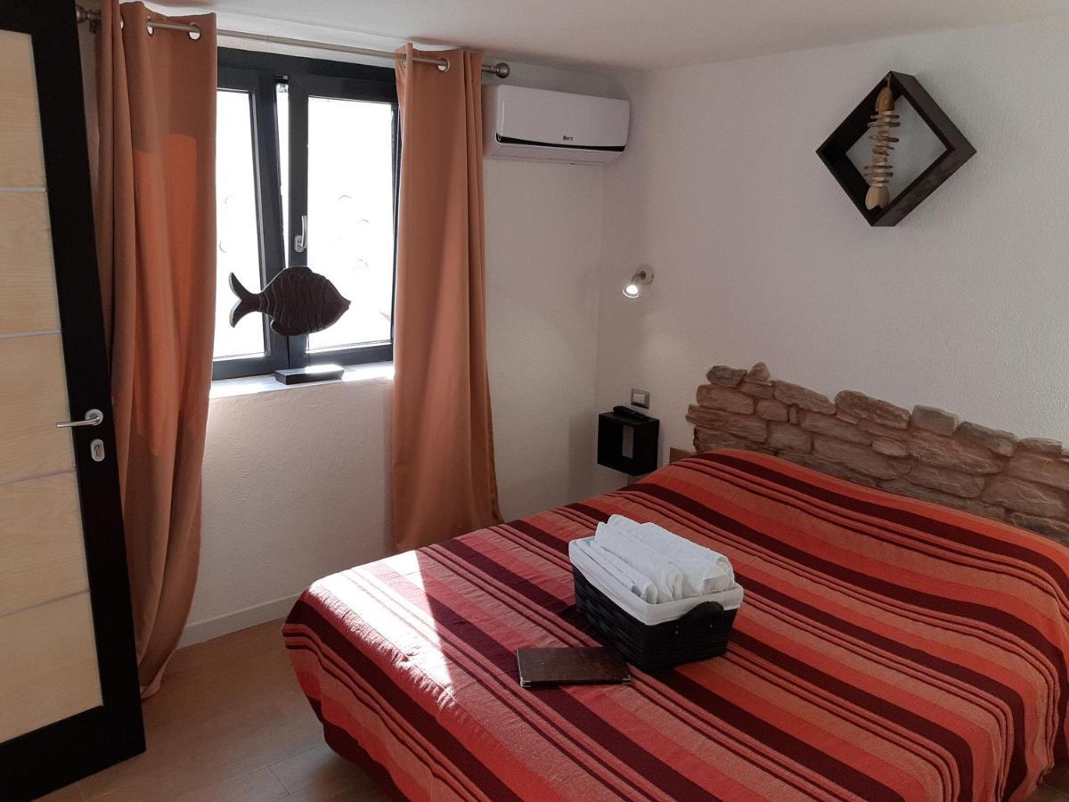 Portopollo Surfhouse Barrabisa Dış mekan fotoğraf